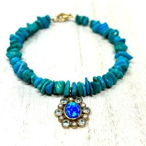 14K floral pendant, turquoise beaded bracelet